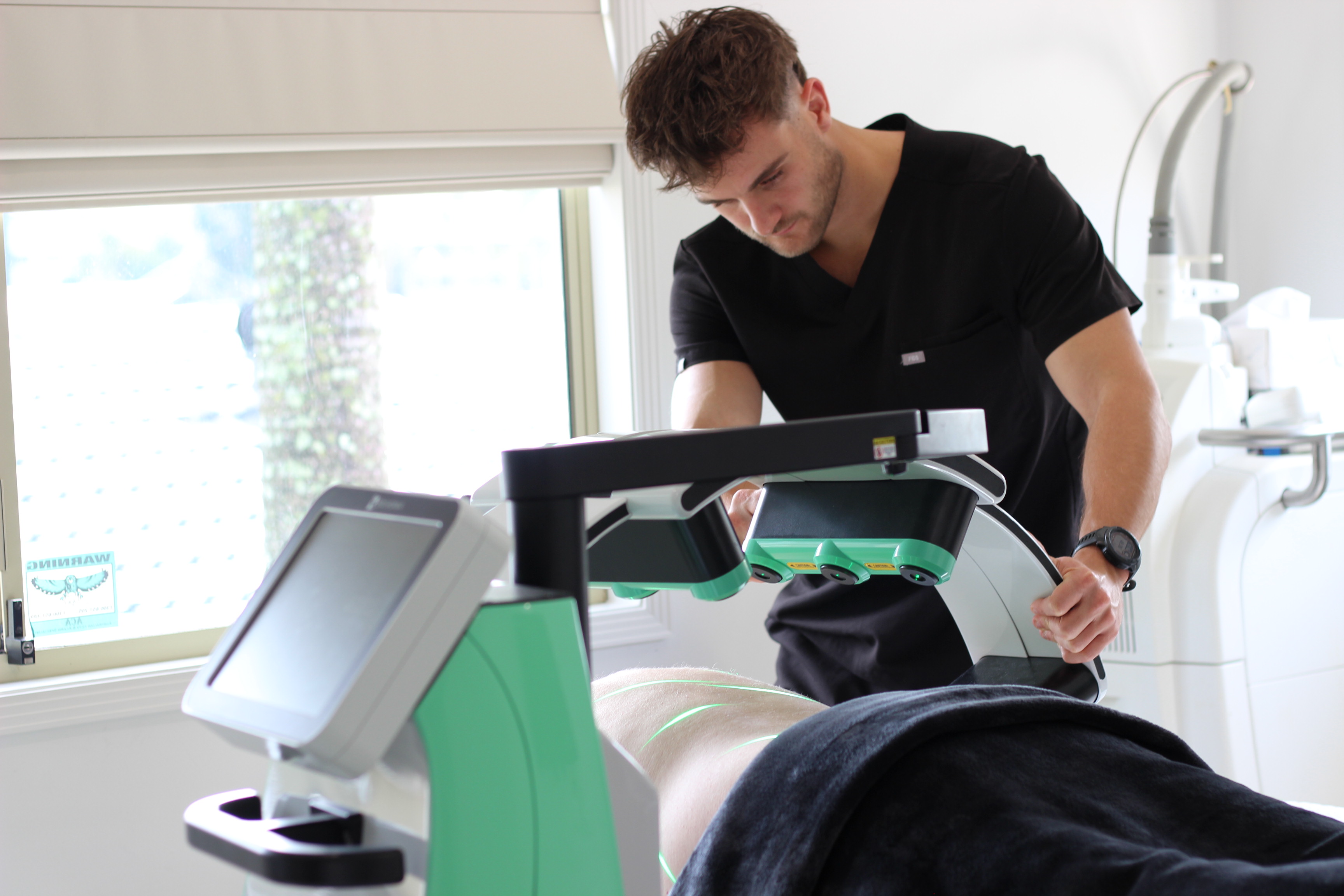 A body treatment in progress at Envisage Clinic