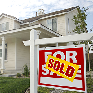 Inherited home with for sale sign representing probate property sale in DFW