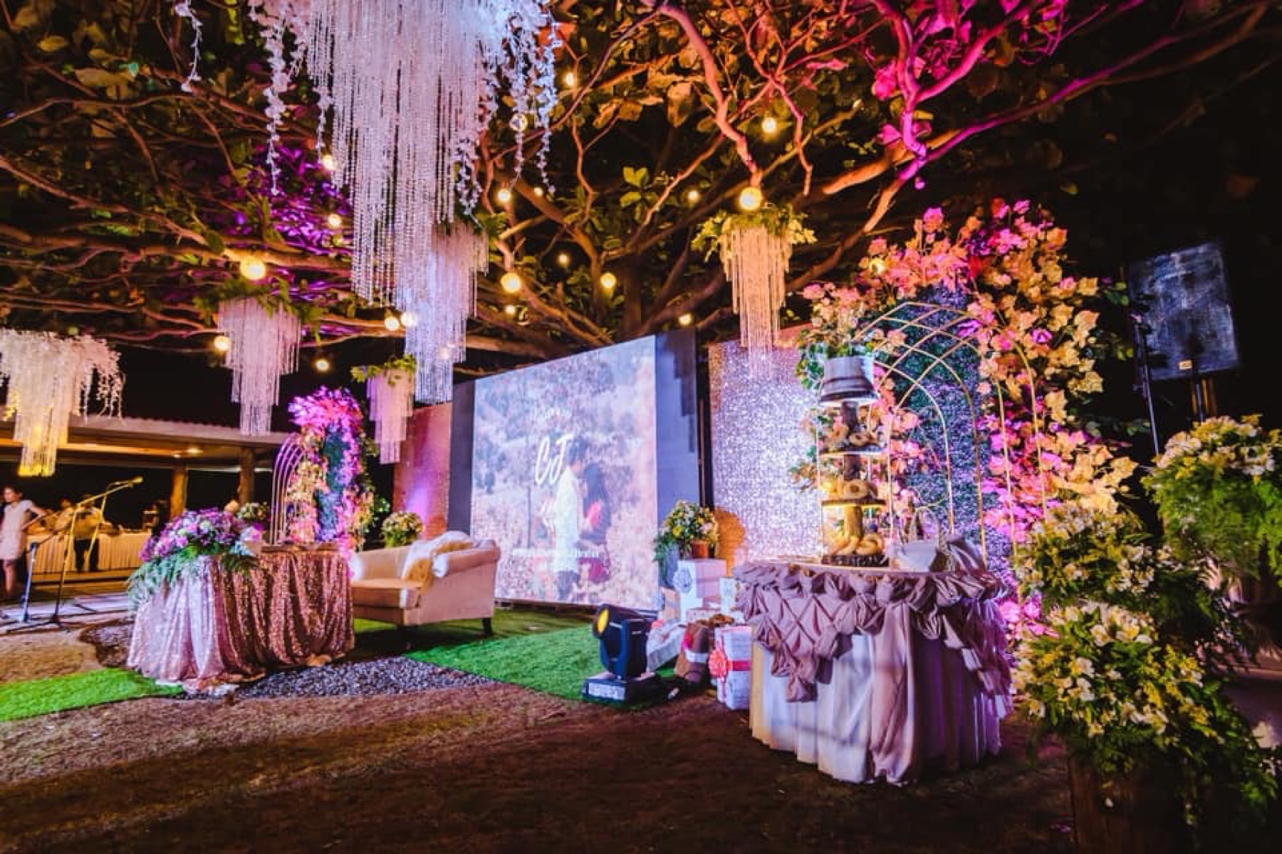Wedding ceremony beneath the beachfront Talisay tree
