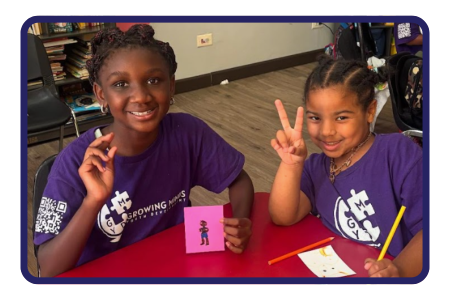 two girls in growing minds t shirts