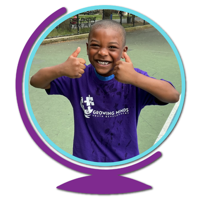 child giving thumbs up and smiling
