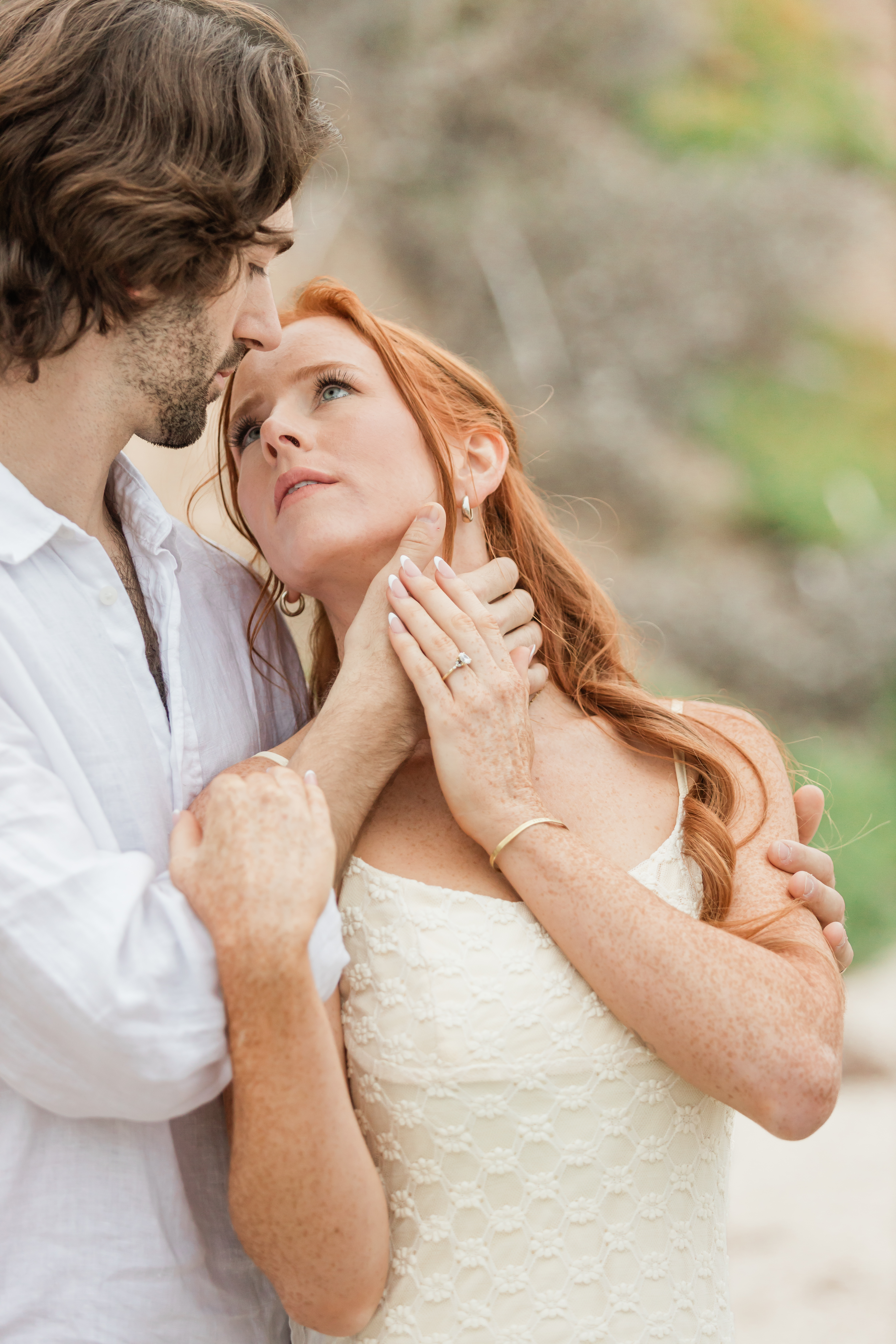 Romantic engagement photo with soft direction, natural connection, and documentary-inspired posing by a wedding photographer in Dallas.