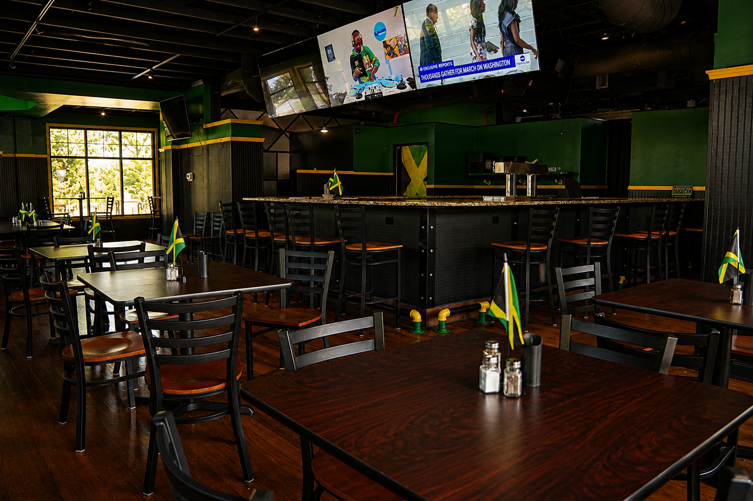 Long tables set for a group at Mama Jerk N Tings