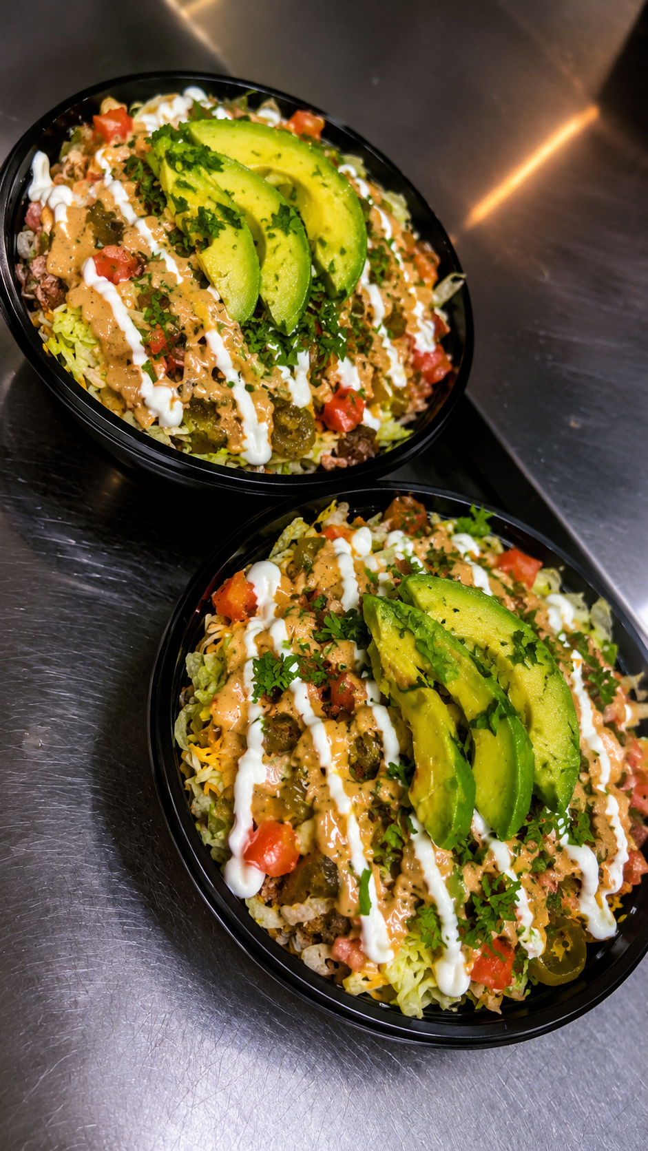 Rice bowls with avocado and sauce