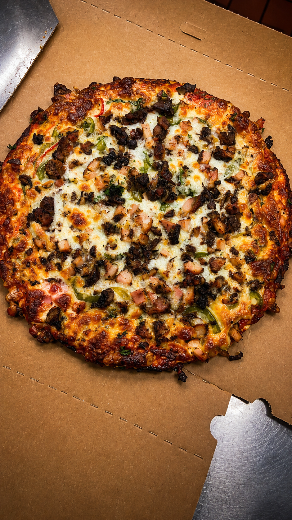 Loaded jerk pizza from the oven