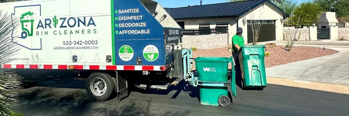 Arizona Bin Cleaners truck cleaning trash bins on suburban street.