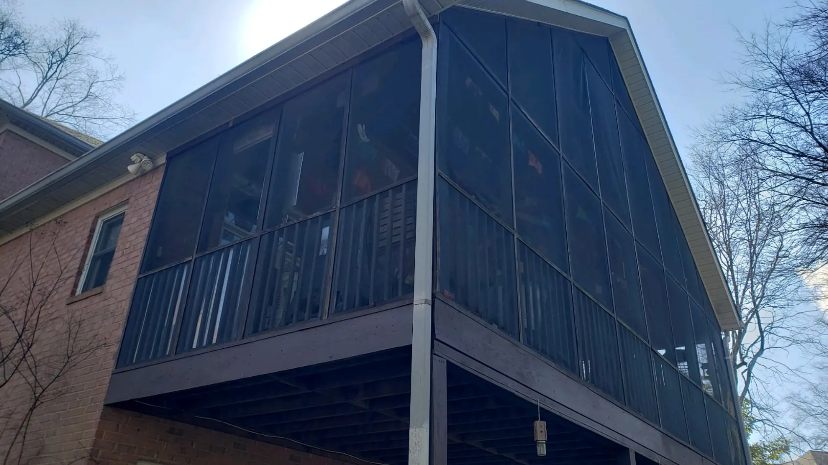 Custom screened porch addition on a Nashville TN home built by JB's Enclosures