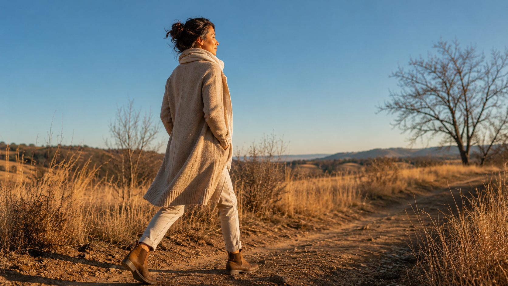 A woman walking in nature, in the Johannesburg winter highveld