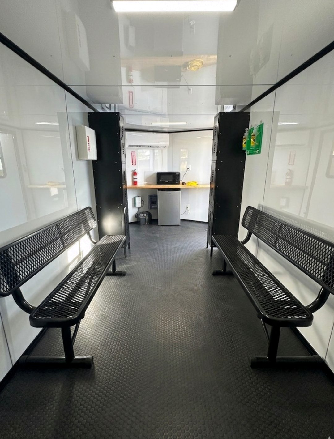 A/C trailer interior — bench seating