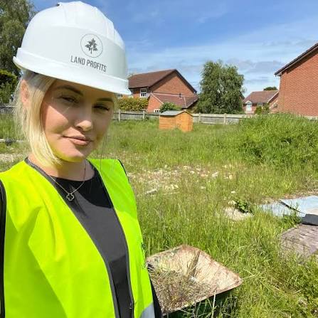 Ella Hardy on a development site in a Land Profits hard hat