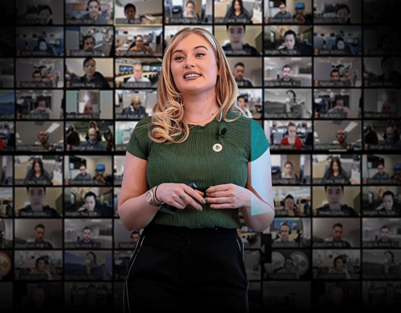 Ella Hardy presenting live to a wall of online attendees