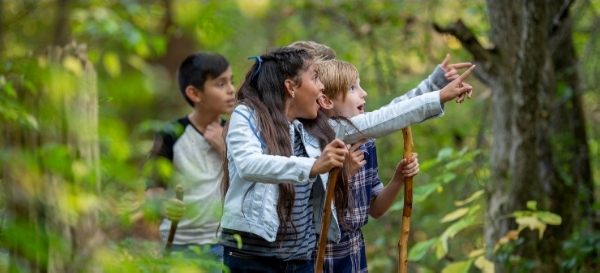 A kid engaged in a hands-on Skhillz activity