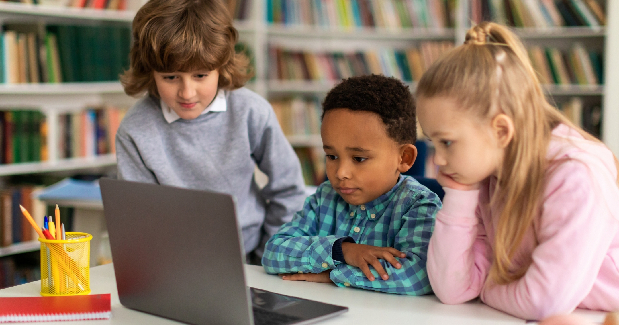 A young learner smiling during a live online class