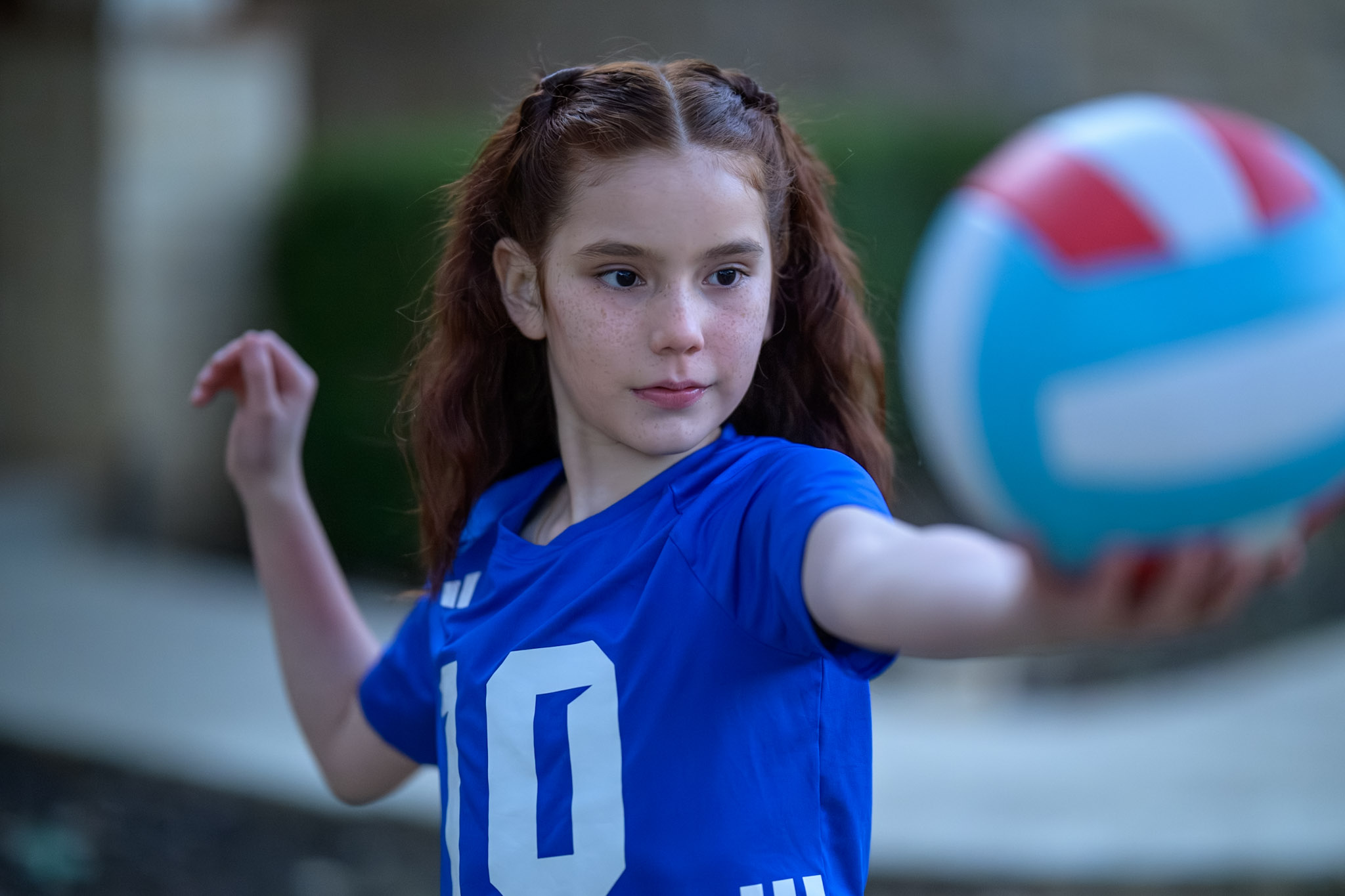 Sabrina with a volleyball outdoors