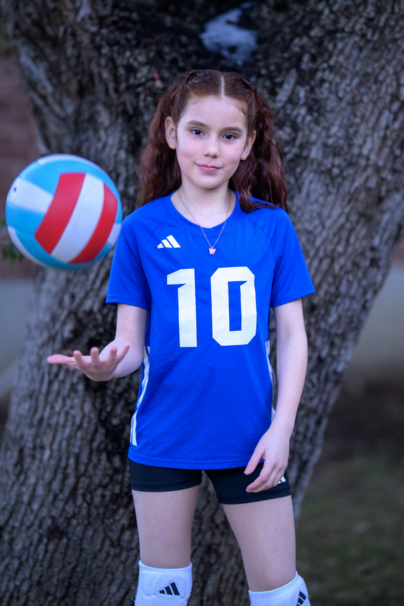 Sabrina holding a volleyball