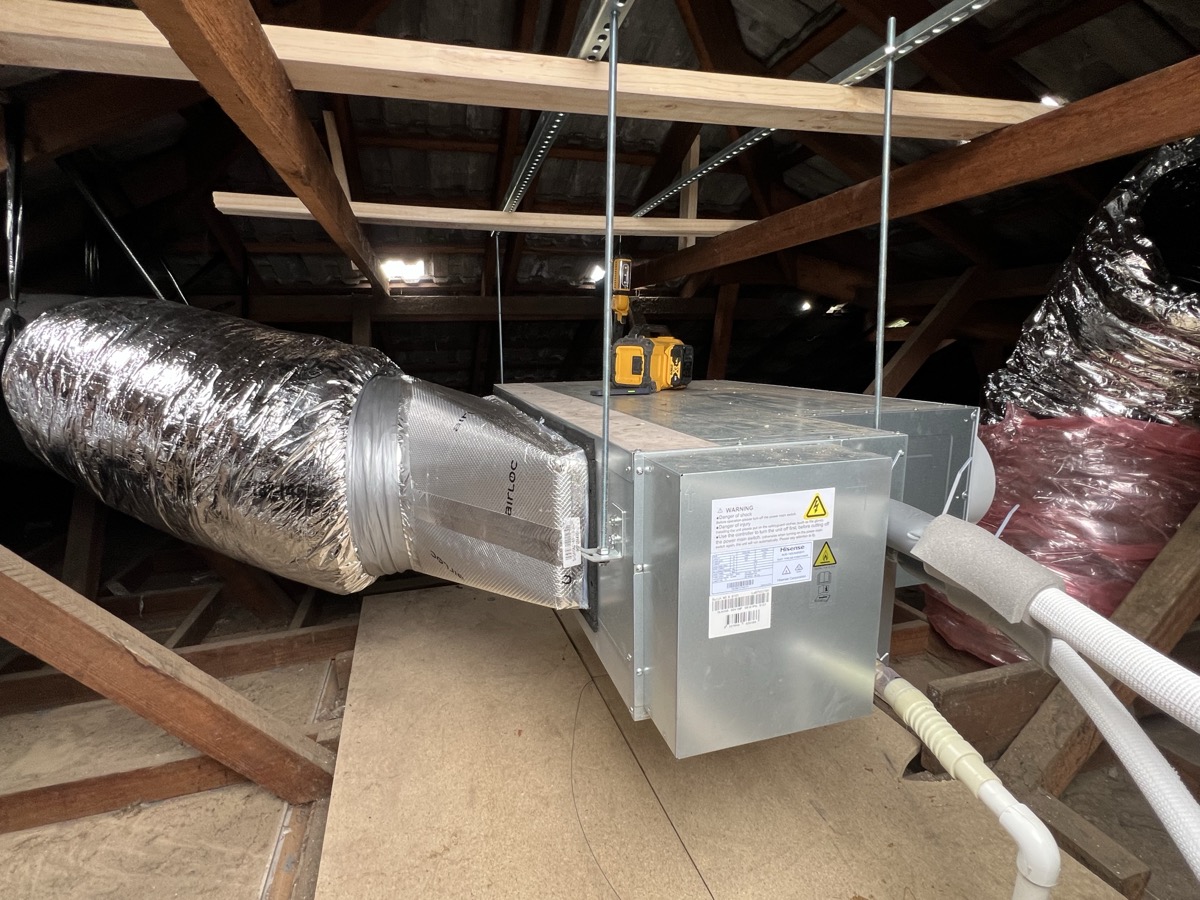 Ducted reverse cycle ceiling vent in modern home