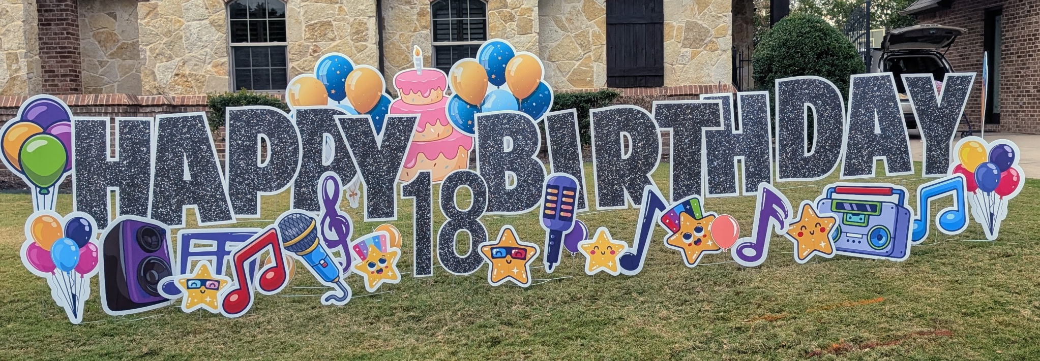 Real Happy 18th Birthday music-themed yard display