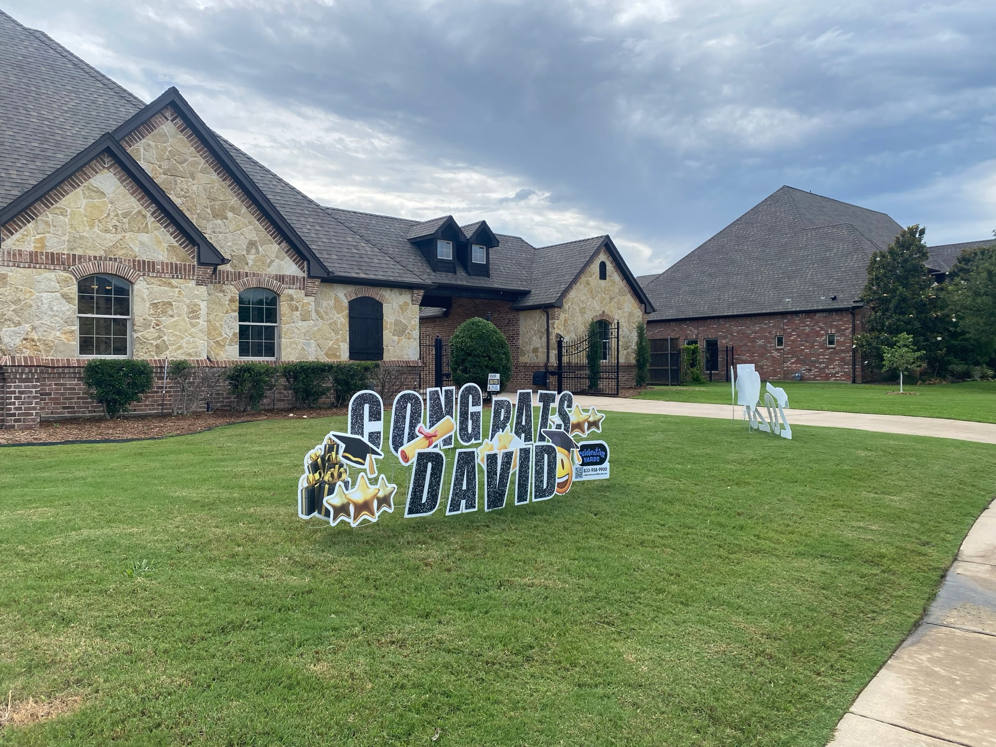 Real Congrats David graduation yard display close up