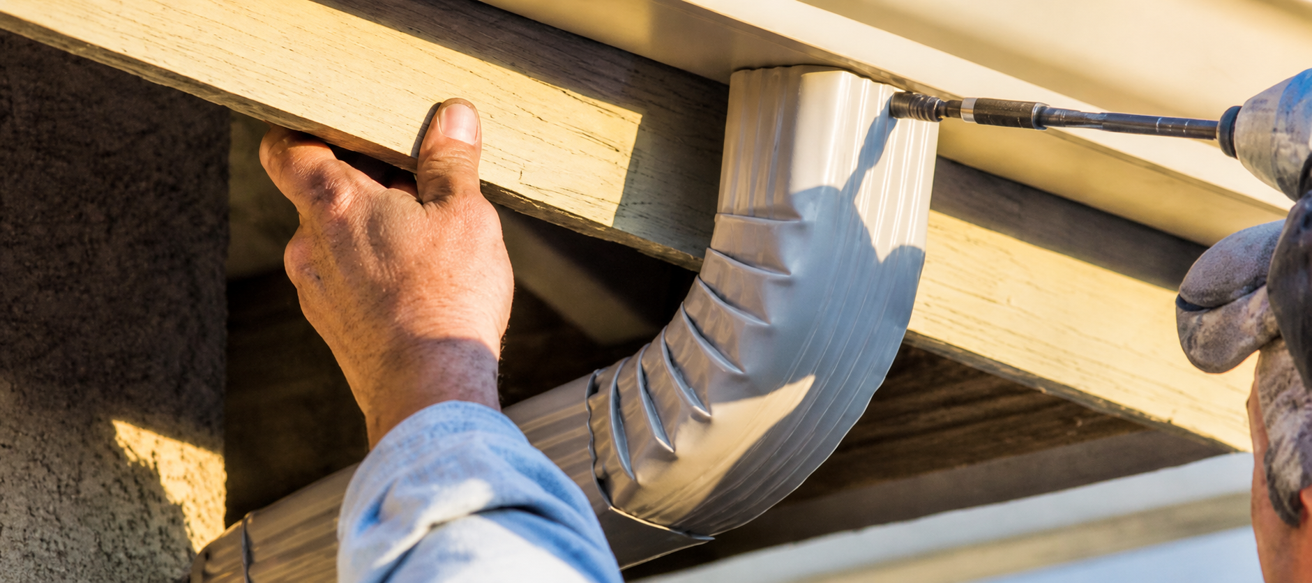 Inspecting and resecuring gutters and downspouts