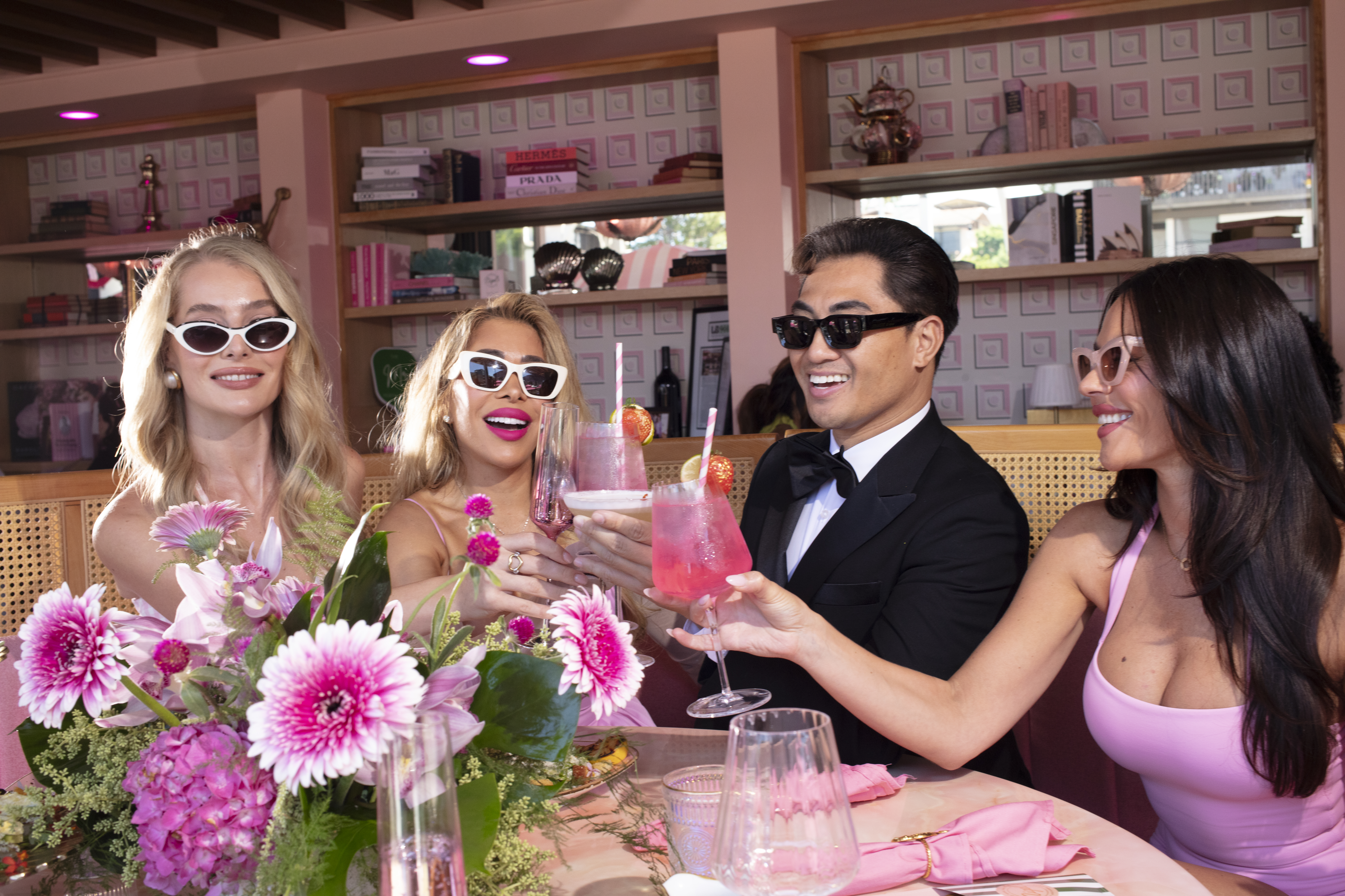 Friends celebrating with cocktails at a luxury Long Beach event venue