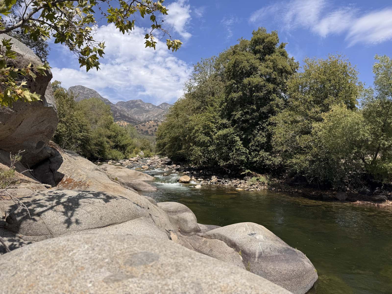 River with granite boulders below the Sierra Nevada mountains in the Tulare County foothills