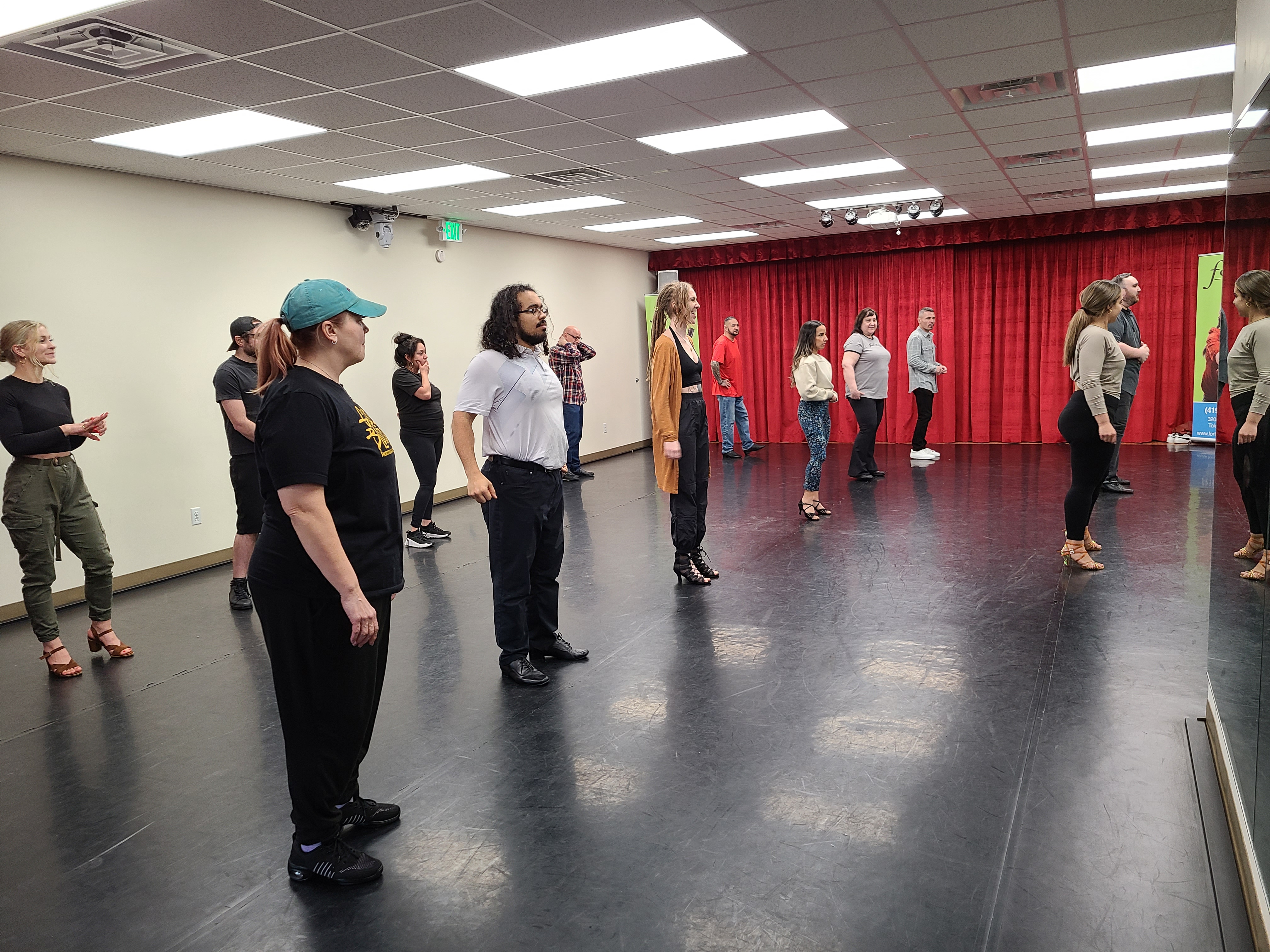 A beginner Bachata class practicing in Toledo