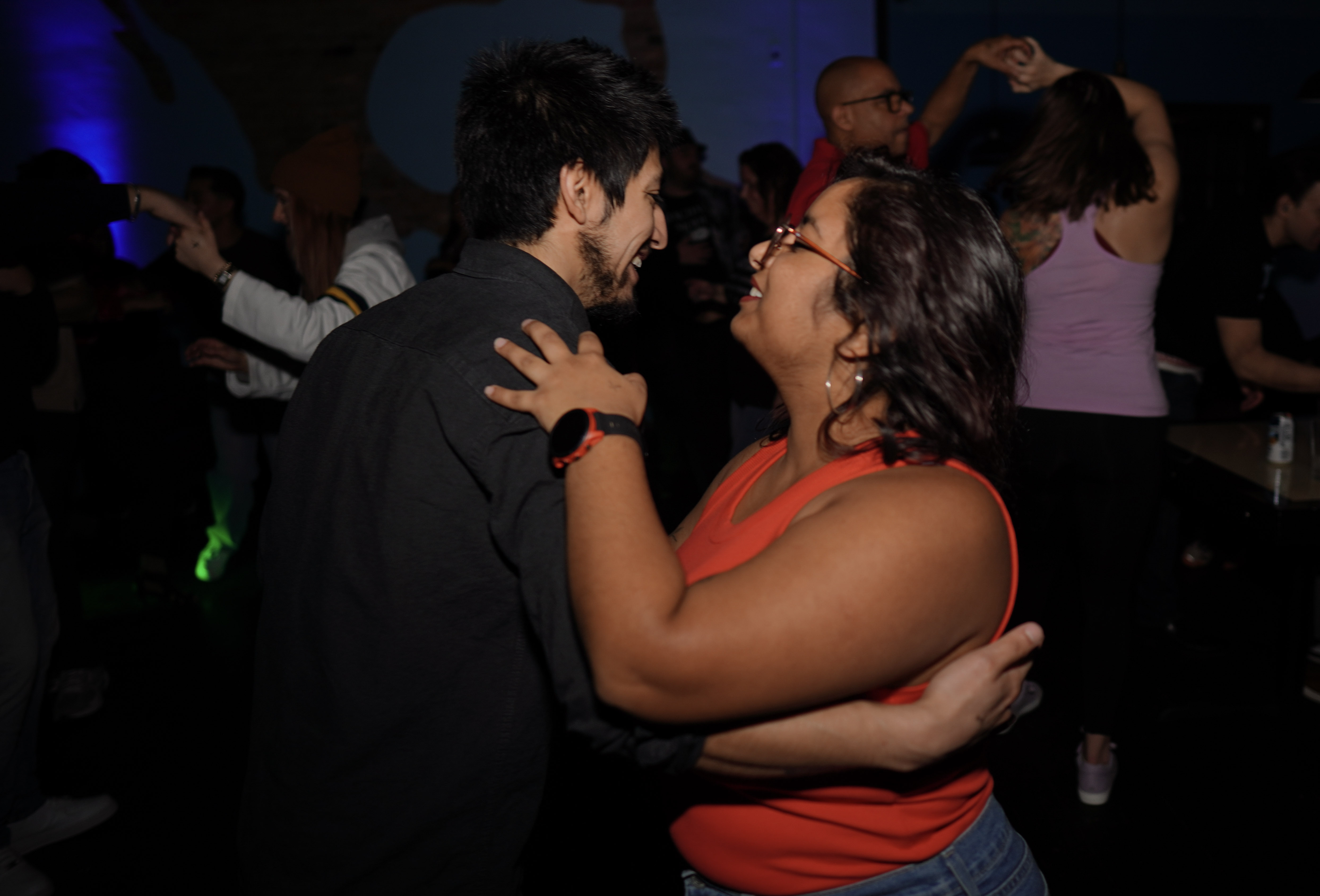 A couple dancing Bachata at a Toledo social