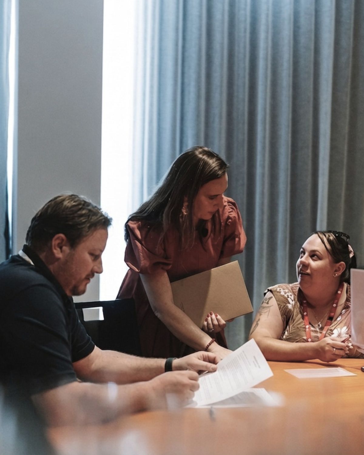 Tara Saxon consulting with clients on worklace strategy