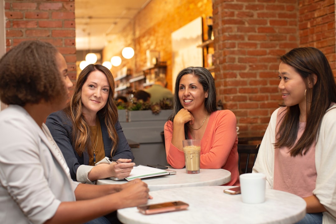 Sales Team in a meeting working on their money patterns