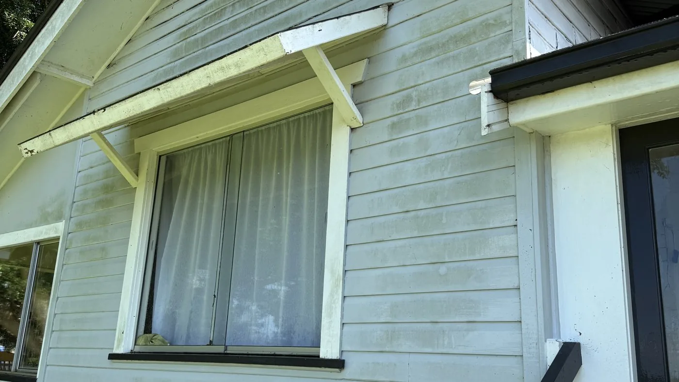 Weatherboard home before
