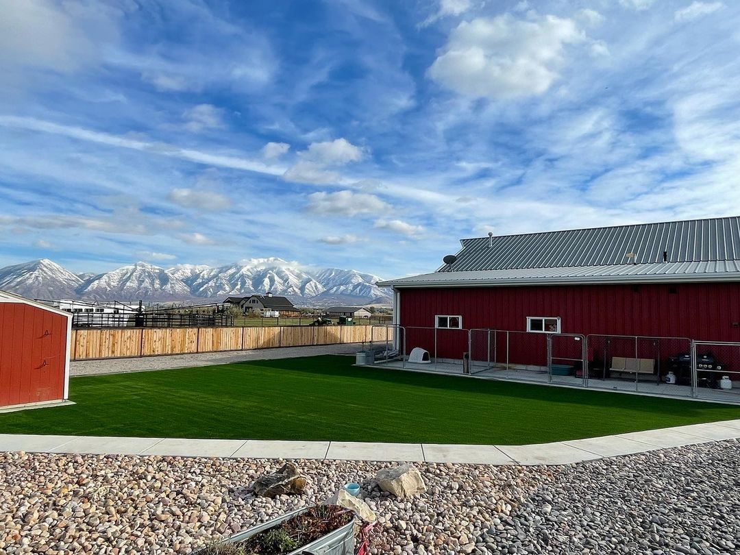 Artificial turf installation in Payson, UT. Backyard turf with dog runs & mountain views
