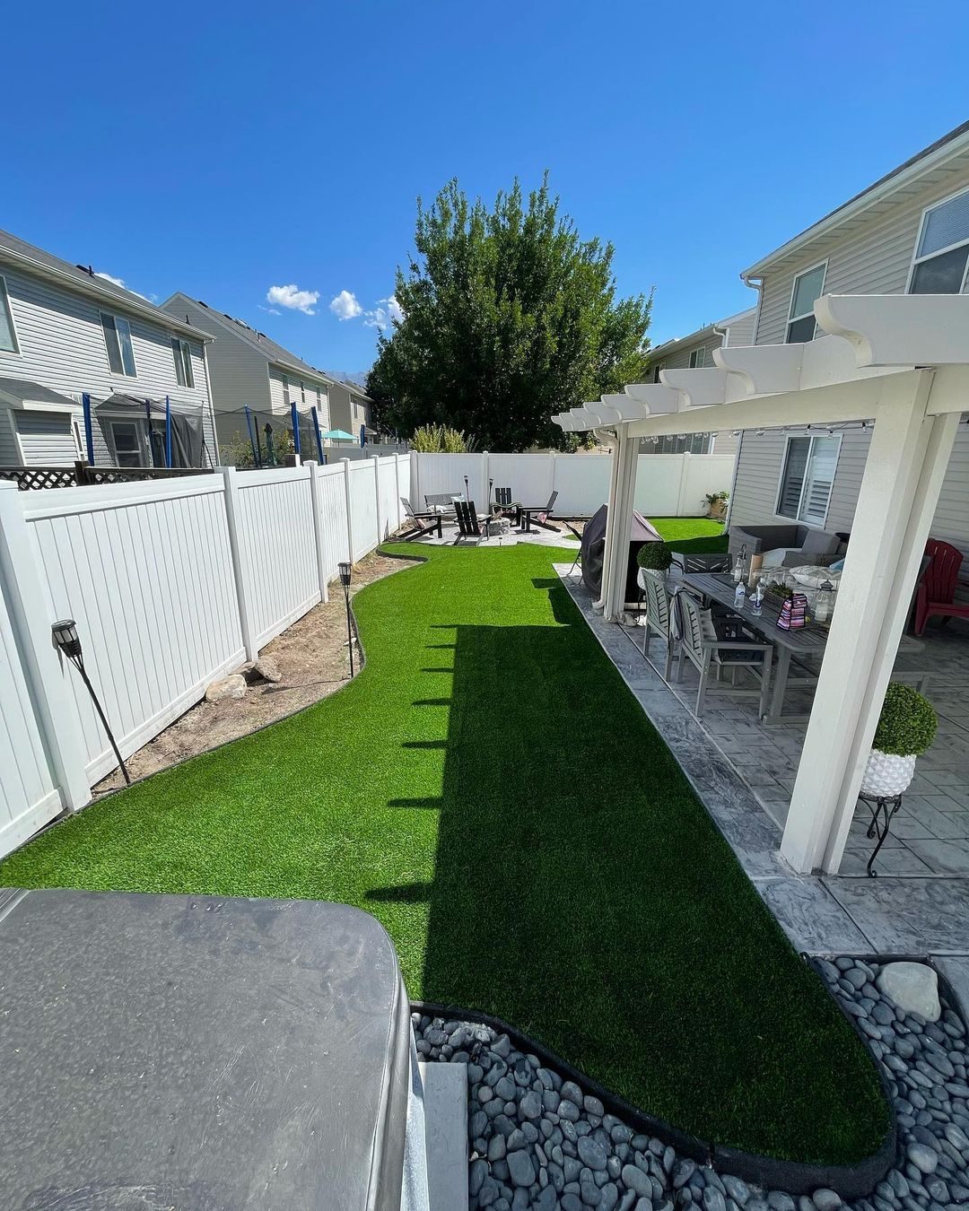 Artificial turf installation in Lehi, UT. Side-yard turf & patio