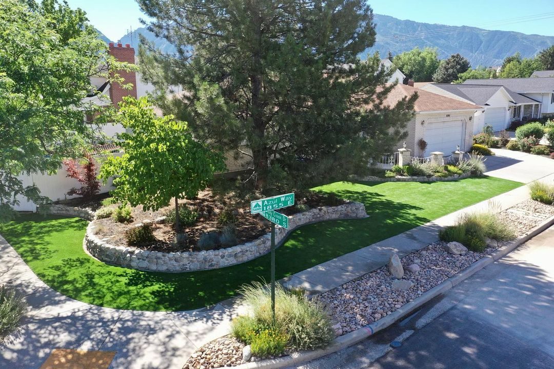 Artificial turf installation in Sandy, UT. Front-yard turf & landscaping