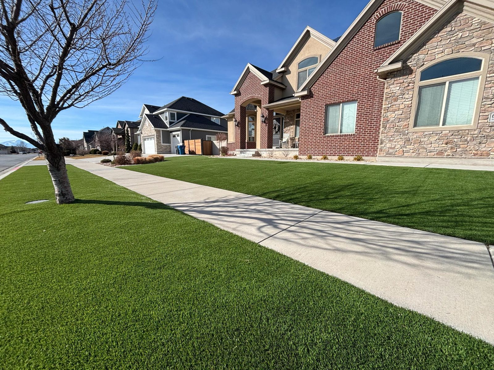 Artificial turf installation in Utah. Front-yard turf & walkway
