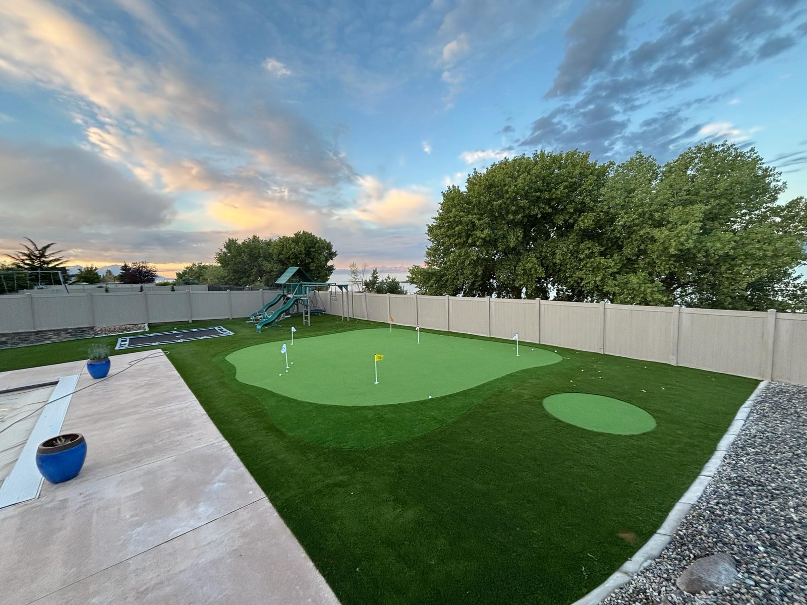 Artificial turf installation in Utah. Backyard putting green & lawn