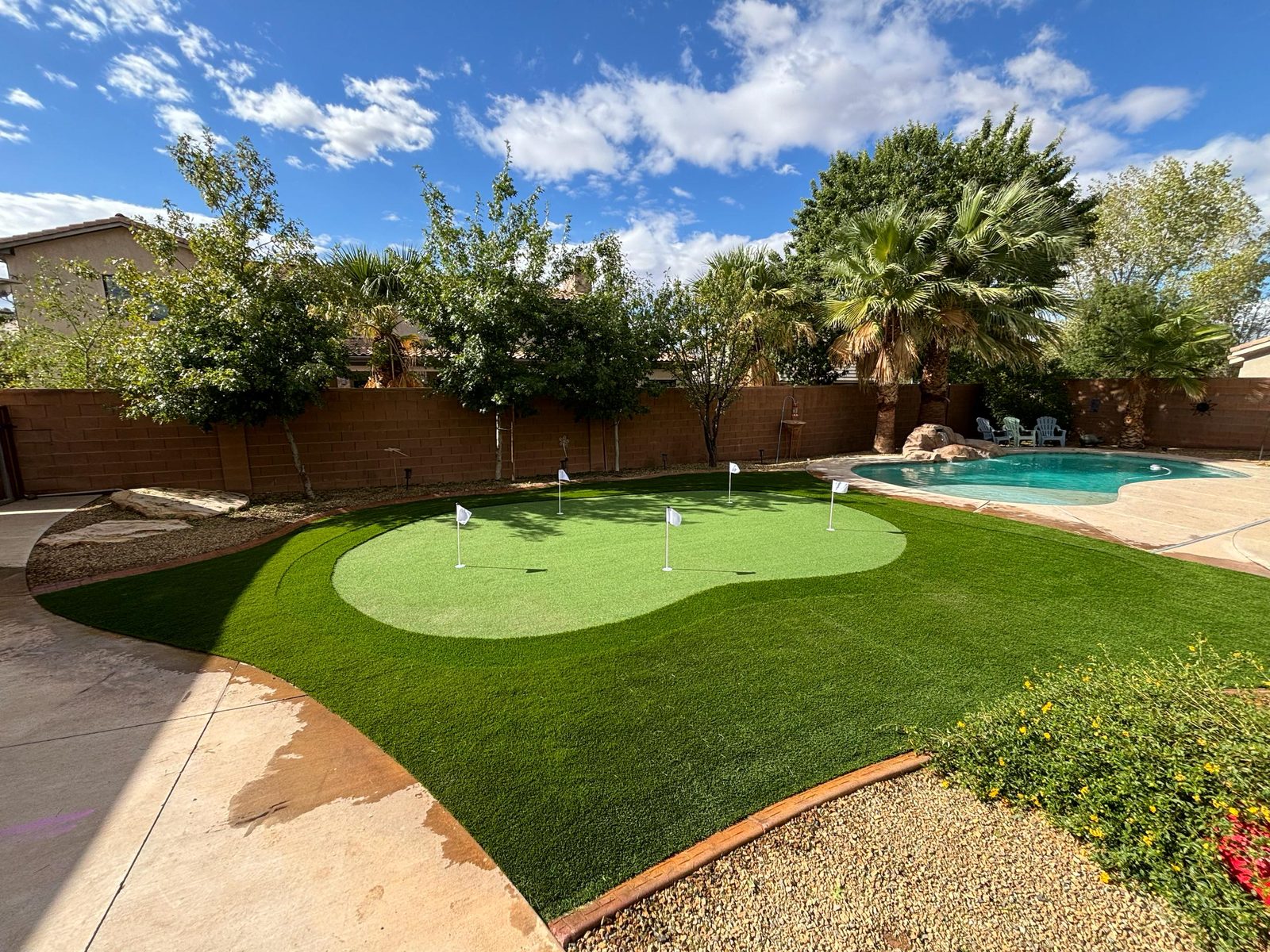 Curved artificial turf putting green with mountain views in Utah