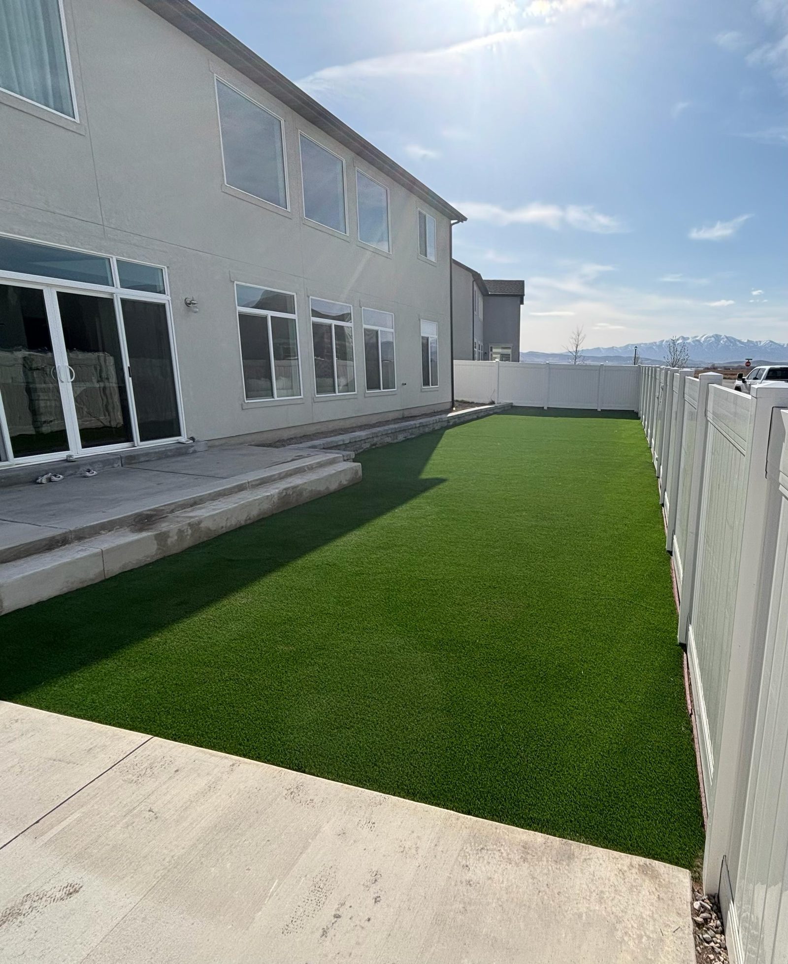 Artificial turf installation in Utah. Side-yard turf & walkway