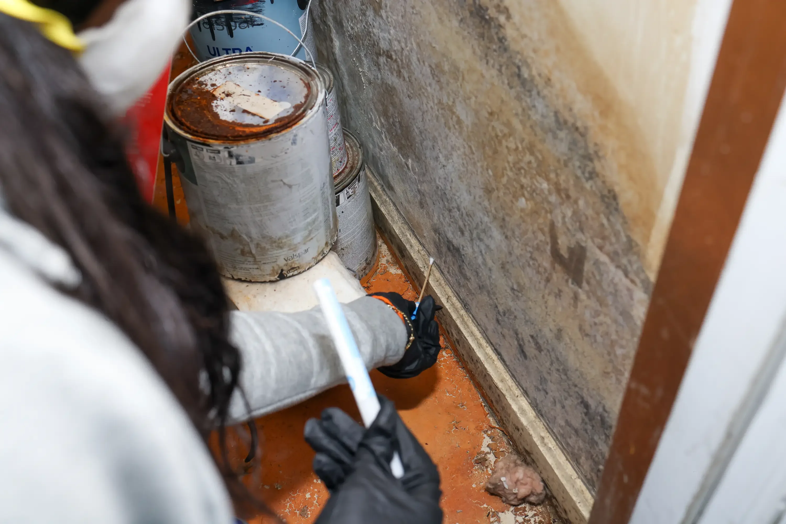 Mold remediation specialist taking mold samples