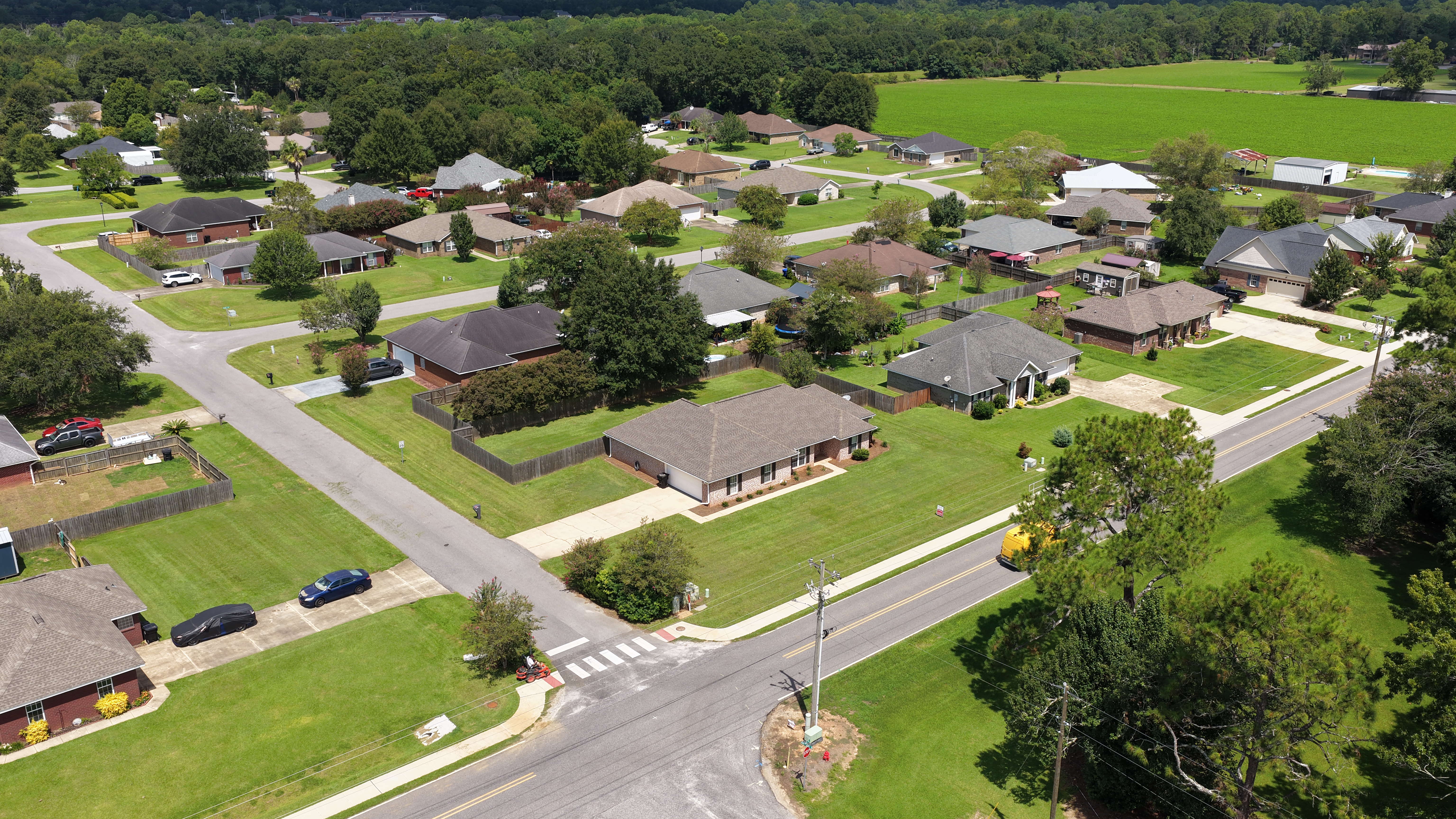 Front left aerial view showing garage