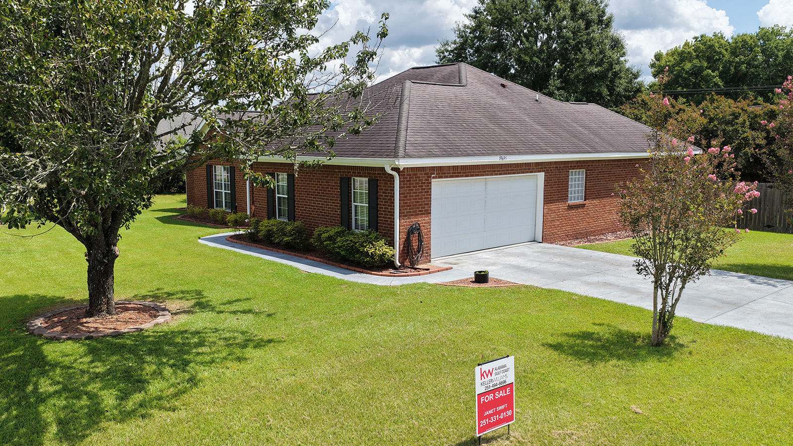 Exterior and garage at 19695 O'Brian Avenue
