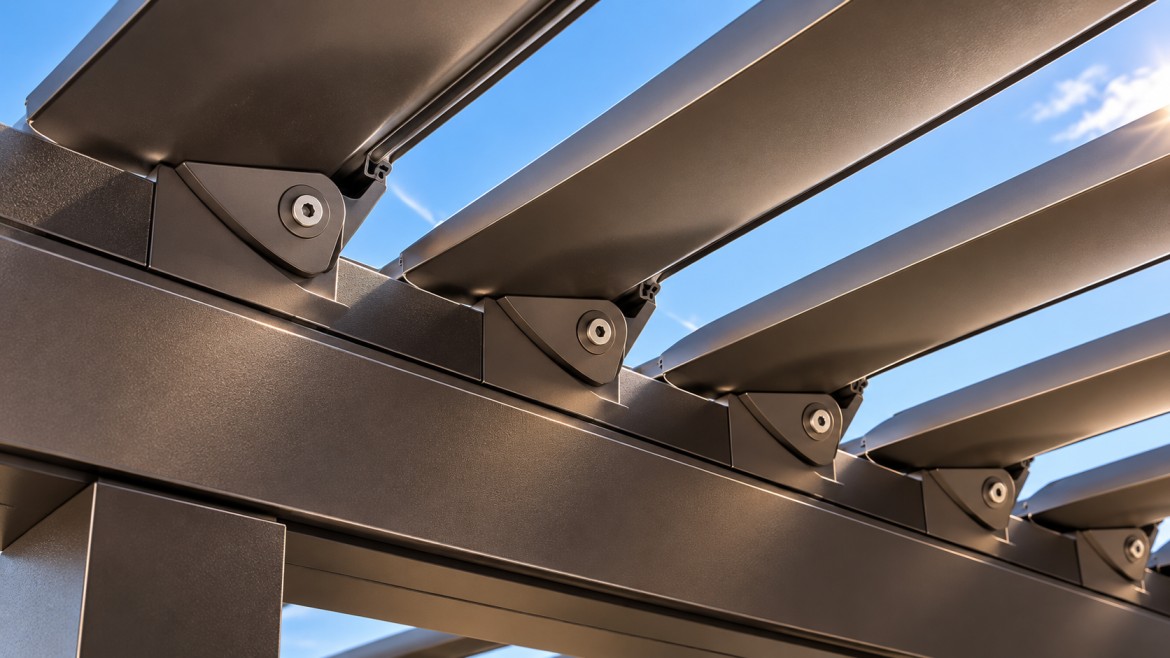 Close detail of aluminum louvered pergola blades pivoting within the frame