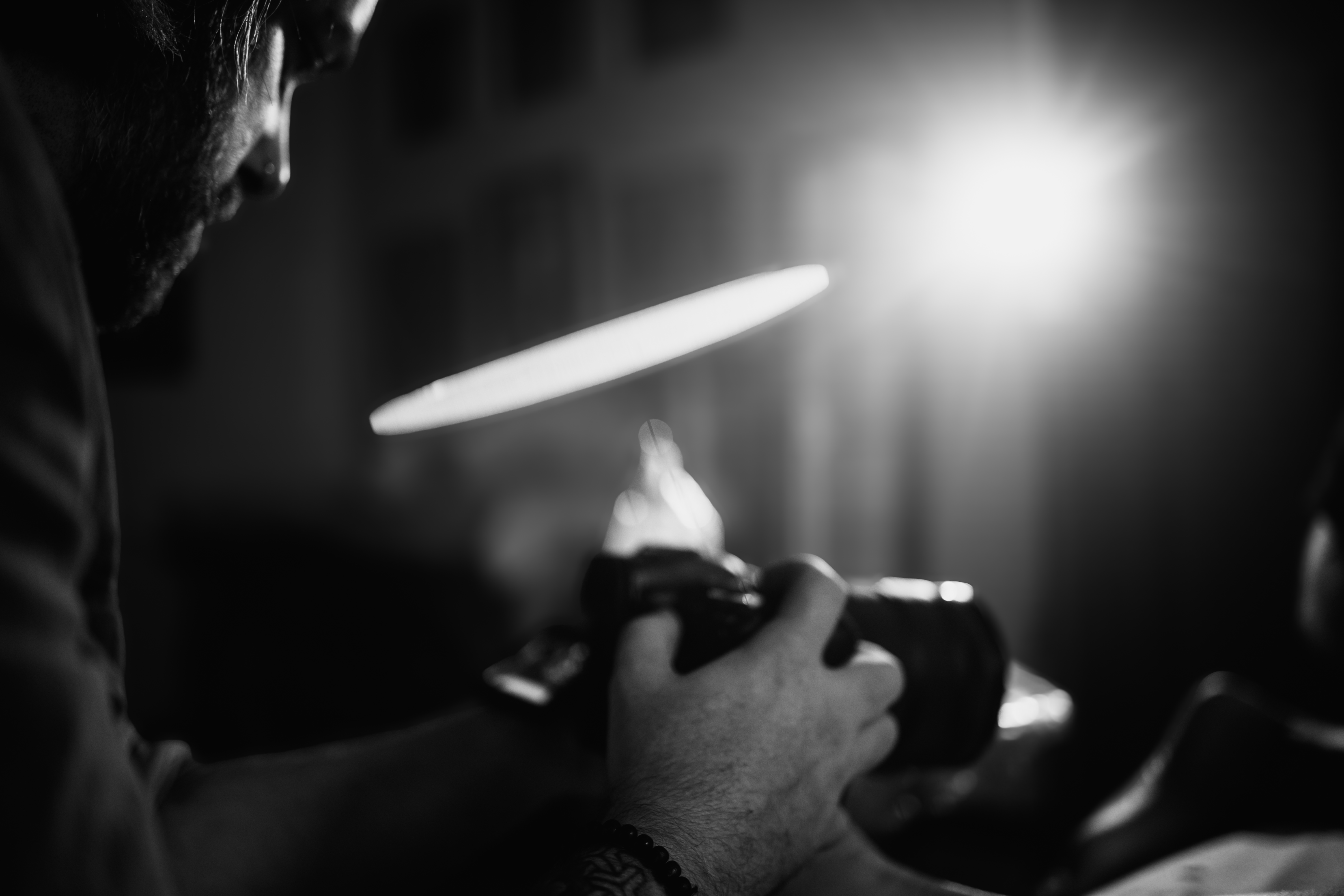 red arbor productions camera man taking photos and video in black and white