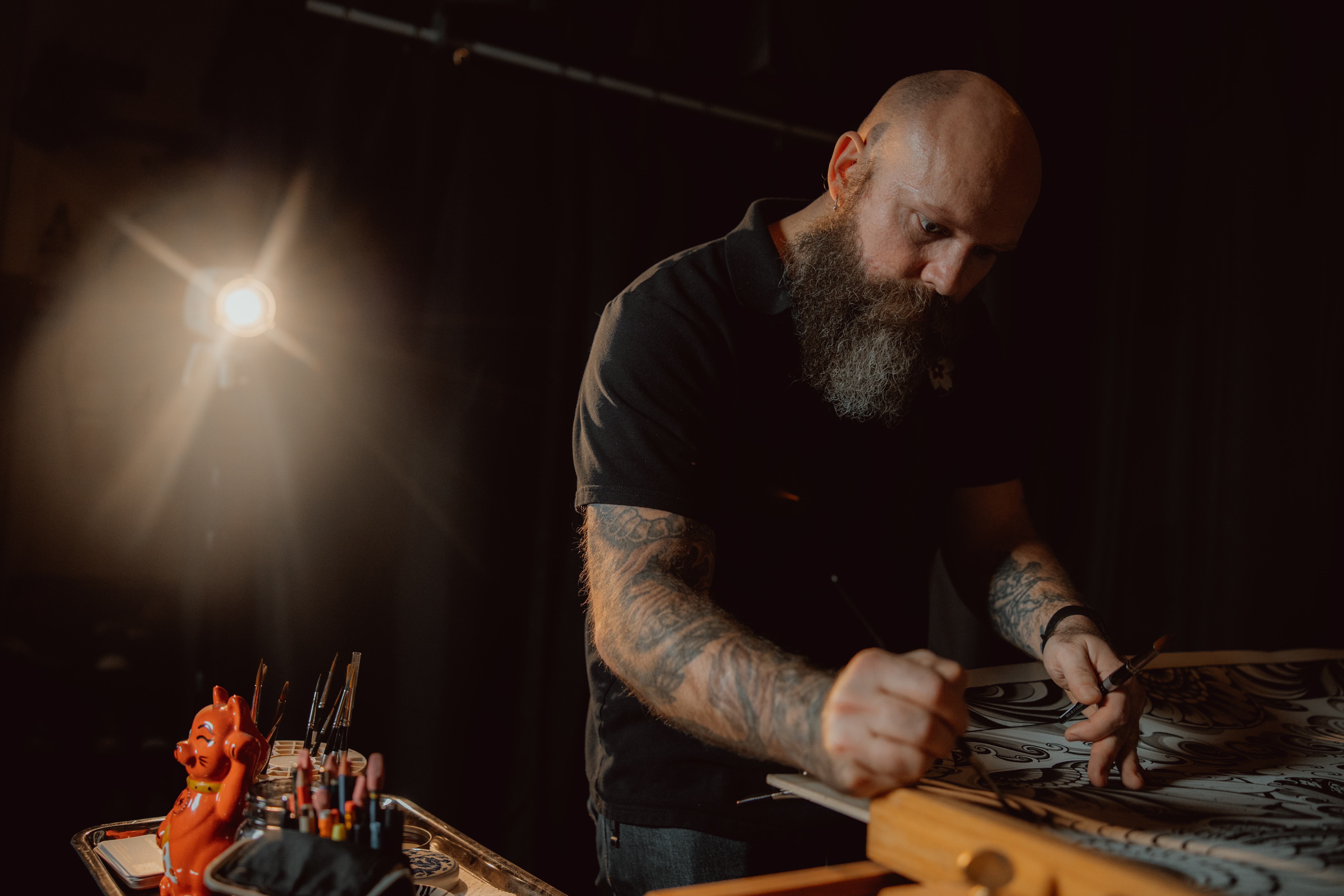 Japanese Tattoo Artist Cory Claussen painting a large watercolor Japanese Tattoo Artist Cory Claussen painting a large watercolor