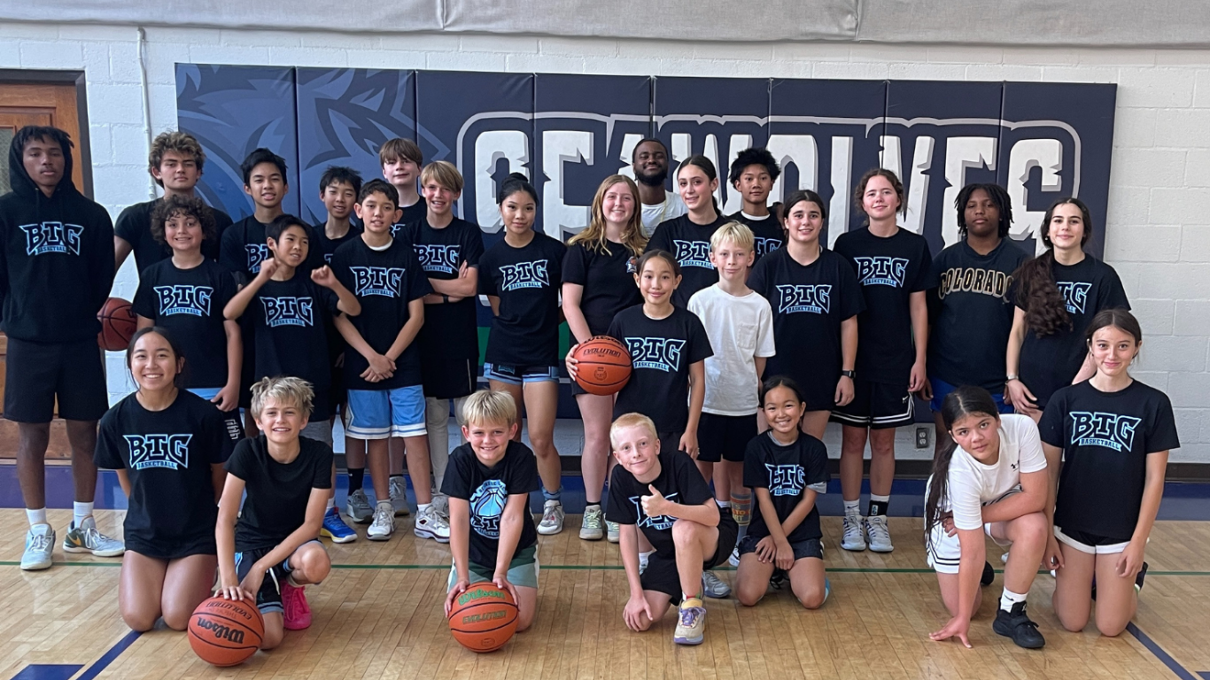 BTG youth basketball team with their coaches