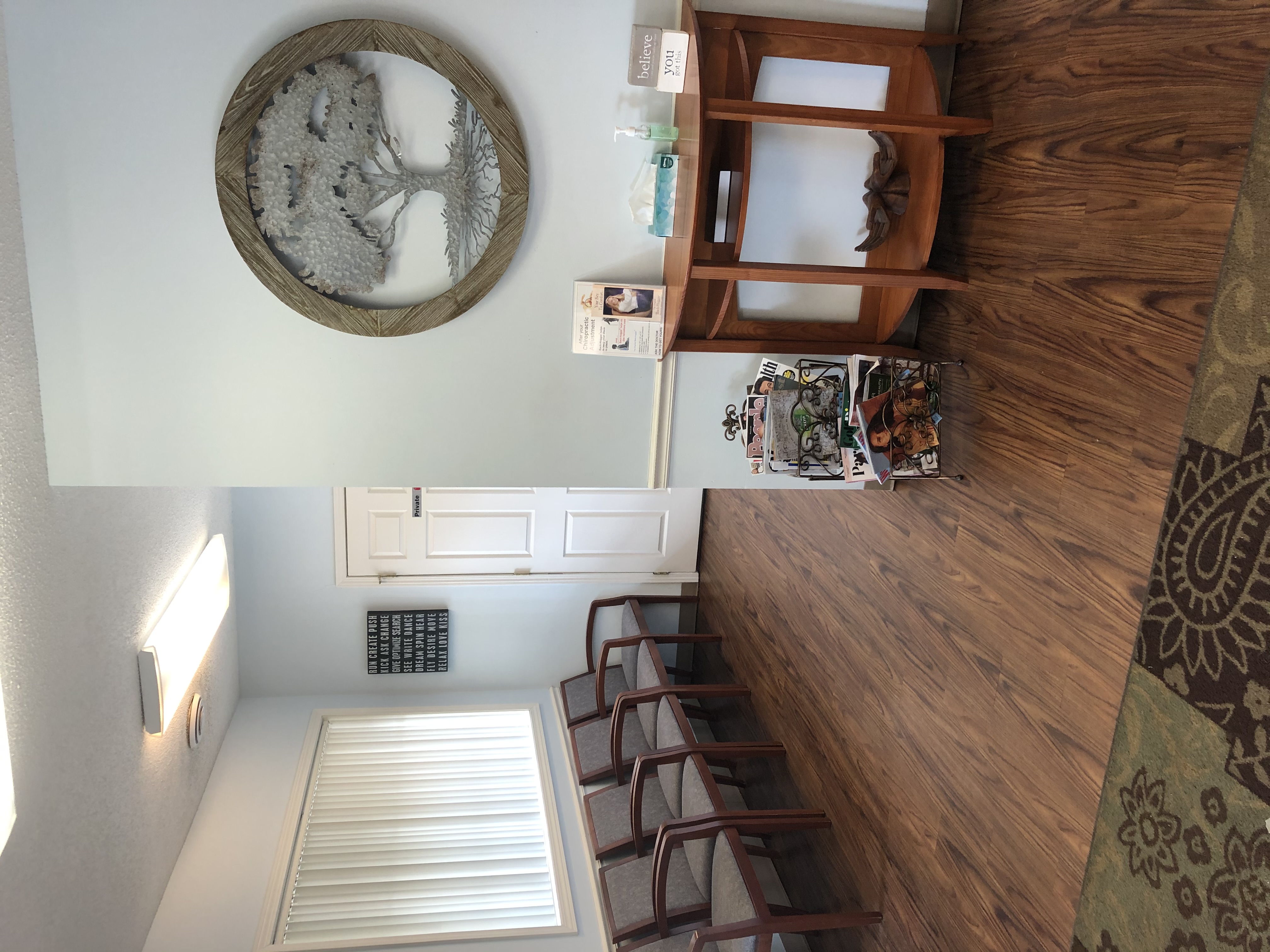 The waiting room and front desk at Sparks Family Chiropractic in Lancaster, Ohio