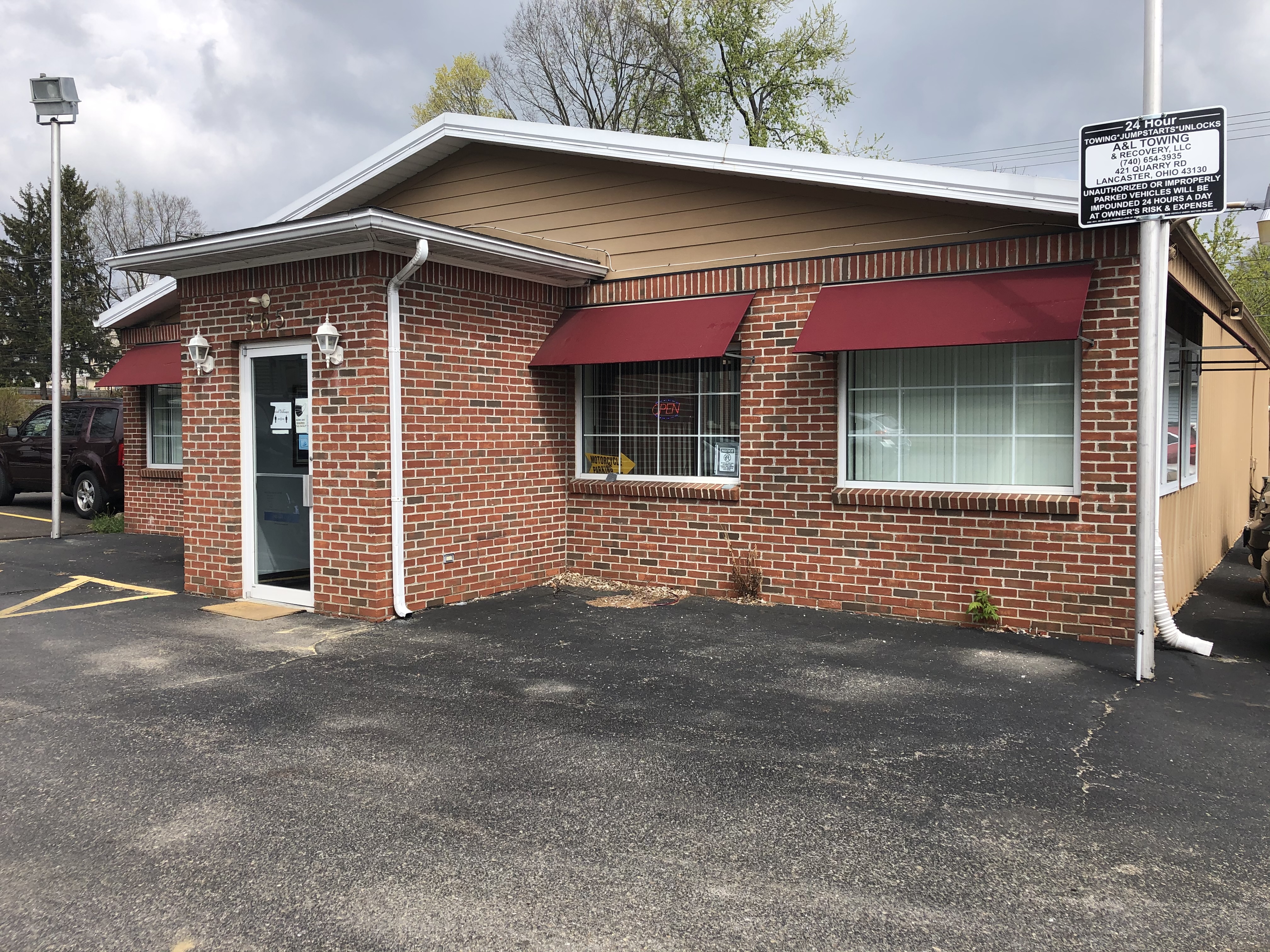 The outside of Sparks Family Chiropractic at 365 East Main Street, Lancaster, Ohio, showing the sign and front door