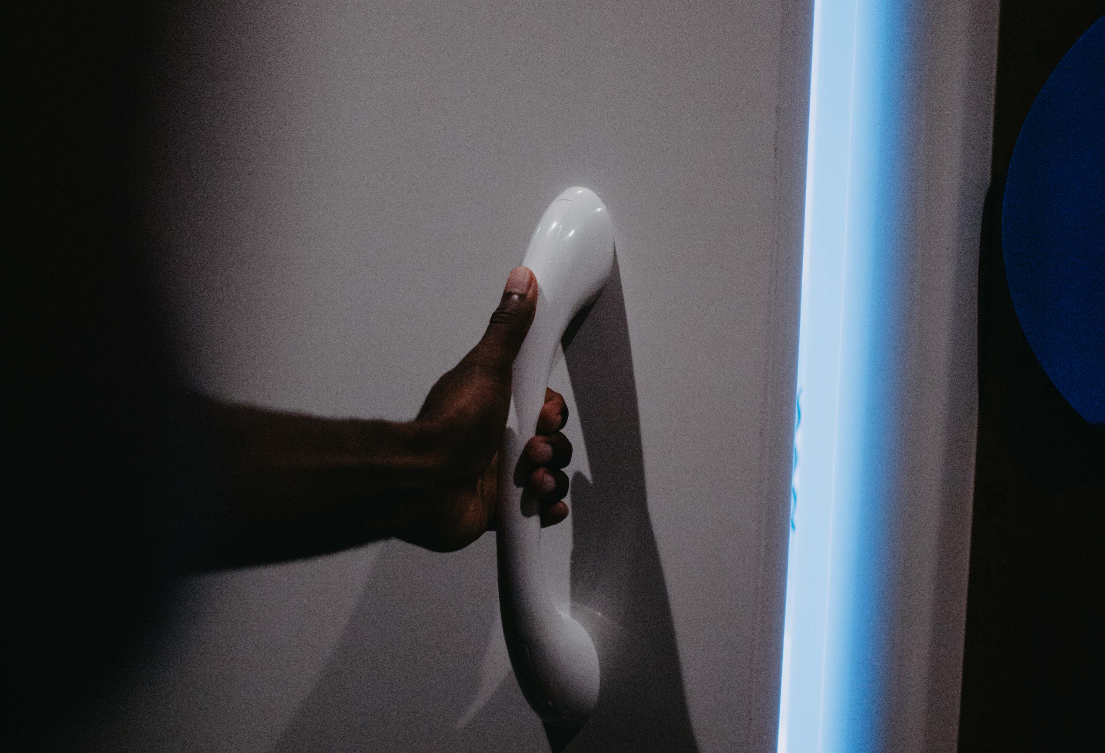 A hand easing the suite door open, the quiet waiting inside.