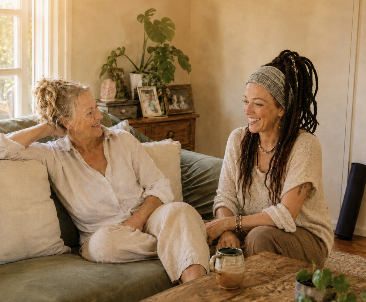 Leisa James, mobile wellness coach, laughing with a client in her Adelaide home