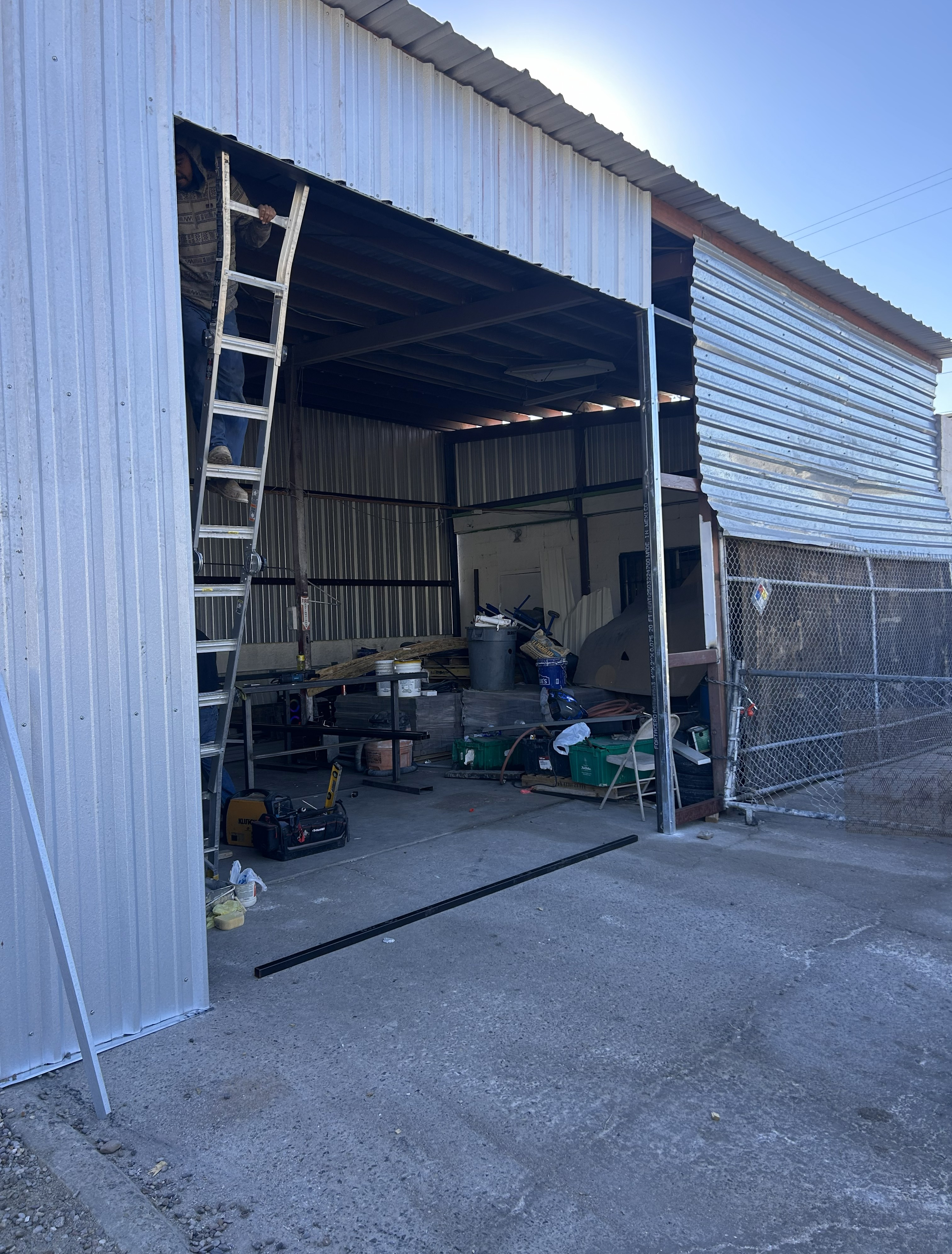 Dented Garage Door Before Service