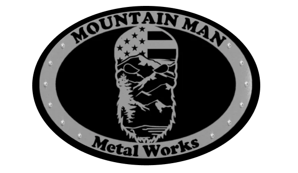 Mountain Man Metal Works logo — an oval metal sign featuring a bearded mountain man with an American flag and mountain landscape, surrounded by a riveted border Mountain Man Metal Works logo — an oval metal sign featuring a bearded mountain man with an American flag and mountain landscape, surrounded by a riveted border